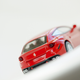 Illustration for article titled Kyosho Ferrari 9 1/64 #71 - Project Prancing Horse #71 - 2011 Ferrari FF